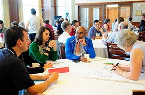 Participants at the DFM’s Community Health Learning Symposium strategize ways to integrate community health and residency training.