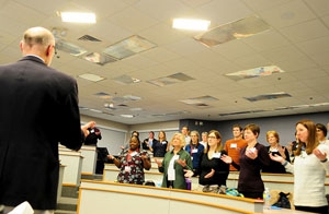 Members of the DFM community do some breathing exercises in between sharing big ideas at the recent Blue Sky event on March 18, 2015 