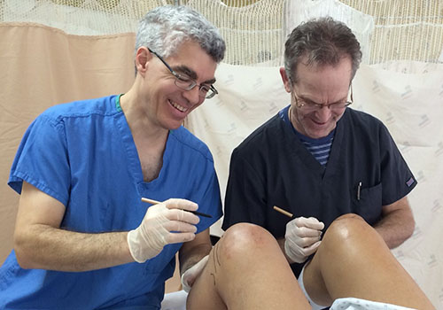 David Rabago, MD, and Michael Weber, MD