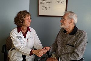 Dr. Hamrick and Lynn Phelps, MD. Now a Capitol Lakes resident, Dr. Phelps is a family physician who created the DFMCH’s original Wingra Clinic. (Photo: Capitol Lakes, Inc.)