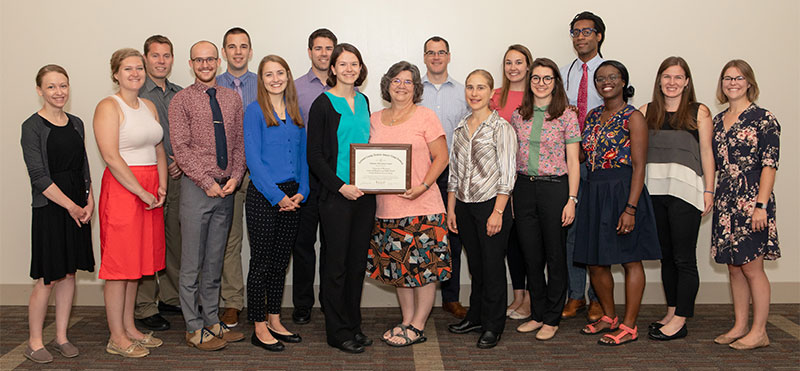 Representatives from the DFMCH and the FMIG receive the AAFP’s Program of Excellence award