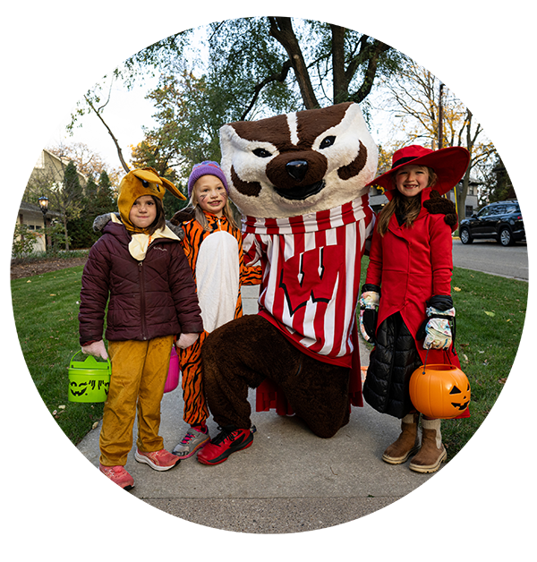 Bucky Badger and kids on Halloween