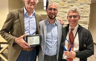 Department chair David Rakel, MD poses with former DFMCH faculty members Bobby Nourani, DO and David Rabago, MD at the annual prolotherapy conference.