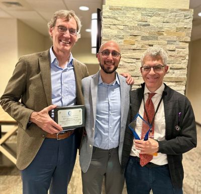 Department chair David Rakel, MD poses with former DFMCH faculty members Bobby Nourani, DO and David Rabago, MD at the annual prolotherapy conference.