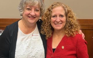 Donna Cole, left, poses with University of Wisconsin–Madison Chancellor Jennifer Mnookin.