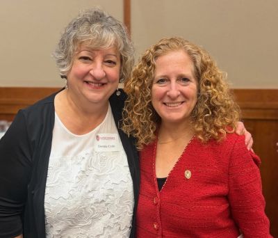 Donna Cole, left, poses with University of Wisconsin–Madison Chancellor Jennifer Mnookin.
