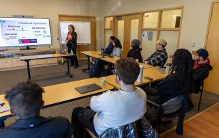A classroom setting with students facing the lecturer.