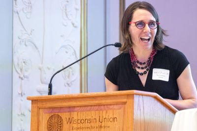 Dr. Kjersti Knox at a podium.