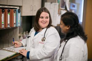 Eau Claire-2916 Jamie Marks with resident 2013